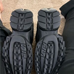 Selling all black fila activewear shoes. Brand new never used. Smoke free home.